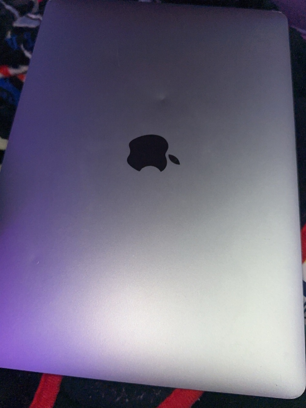 Apple MacBook in Silver with Black Apple Logo